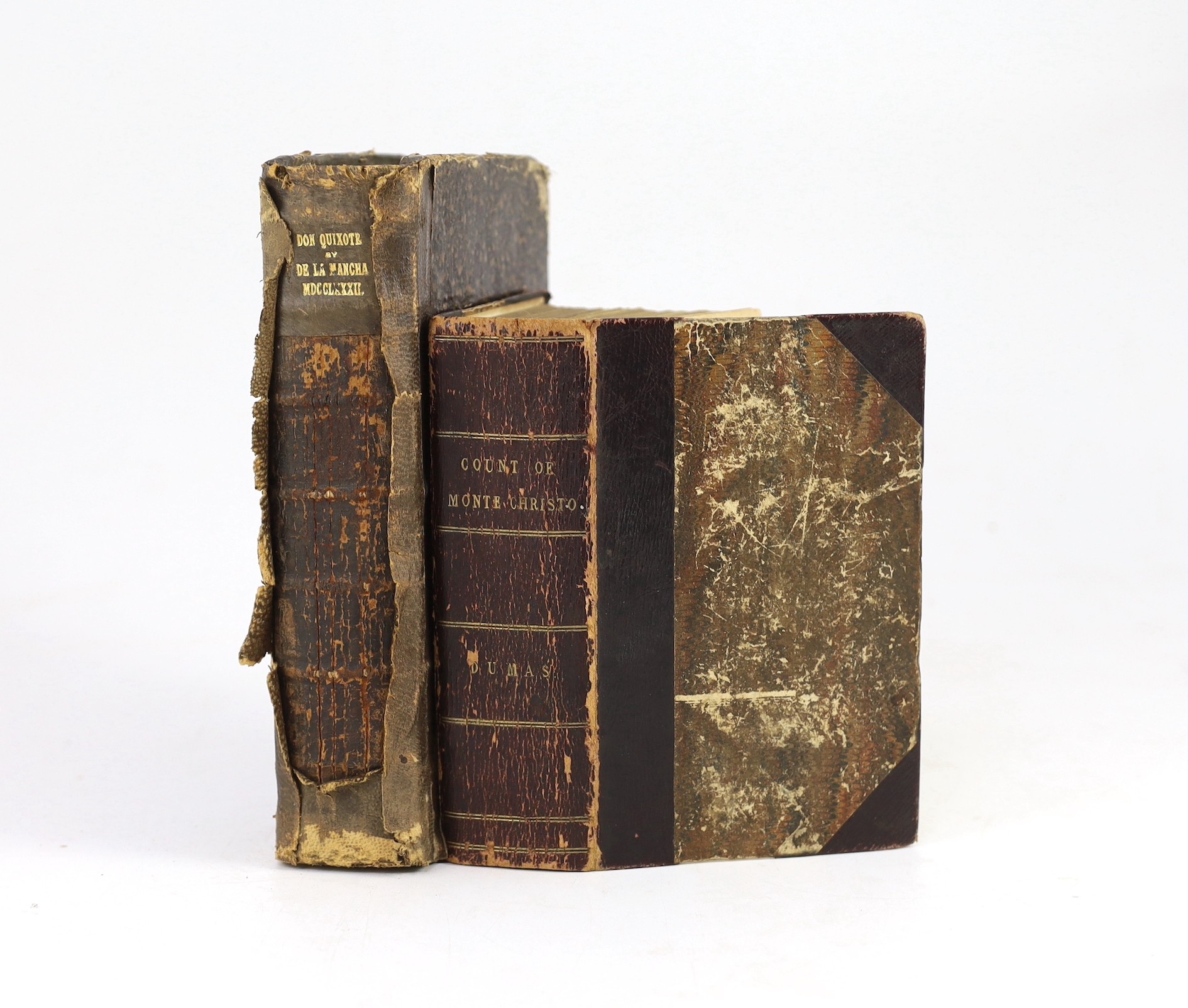 Cervantes, Saavedra, Miguel de - Don Quixote in English, 4 vols in 1, translated by Tobias Smollett, 8vo, with engraved plates, original calf spine cracked, later marbled boards worn at extremities, bookplate of Lord Nap